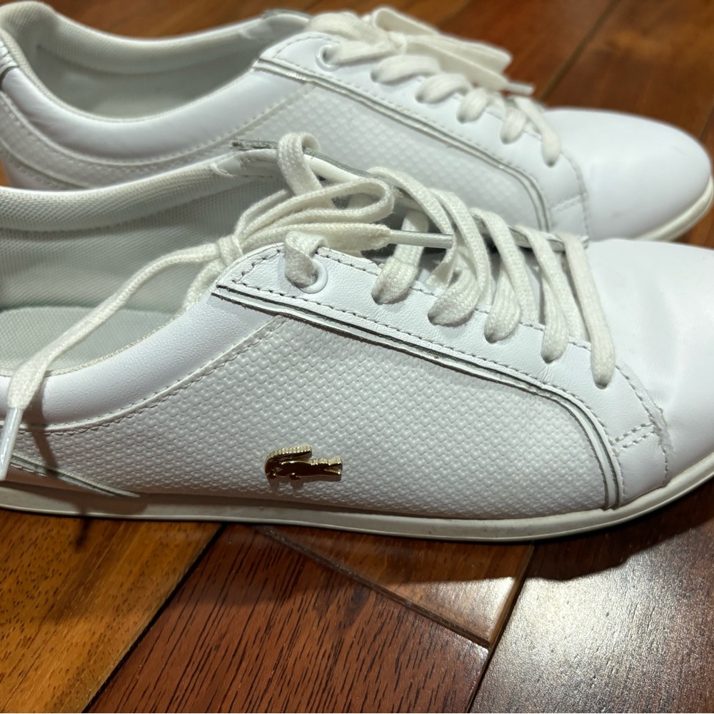 Lacoste White Sneakers with Gold Accent